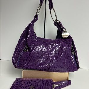 JLo hobo faux snake skin bag
